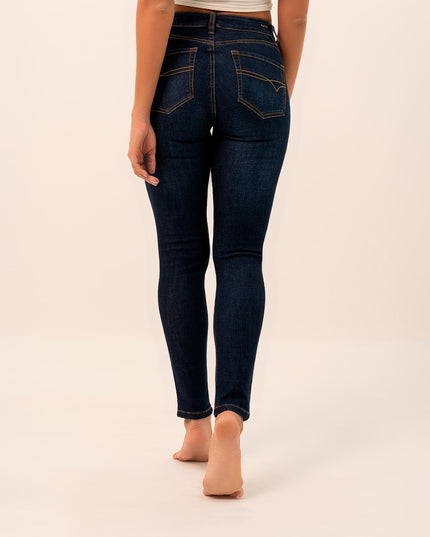 Jean Skinny tiro medio oscuro