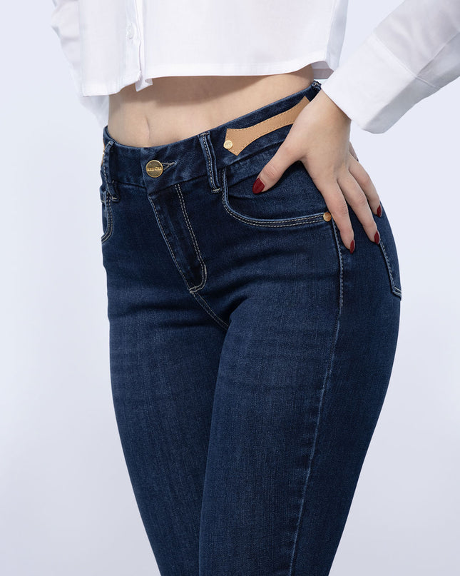 Jean Skinny tiro medio oscuro