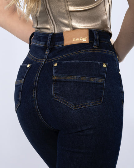 Jean Skinny tiro alto oscuro