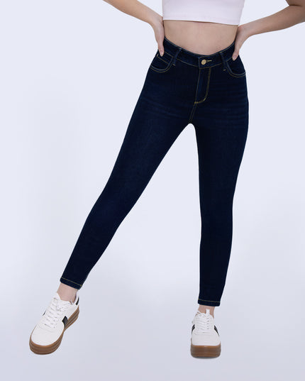Jean Skinny tiro medio oscuro