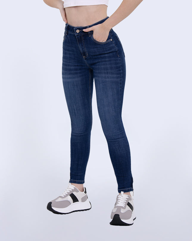 Jean Skinny tiro medio con cierre en bota