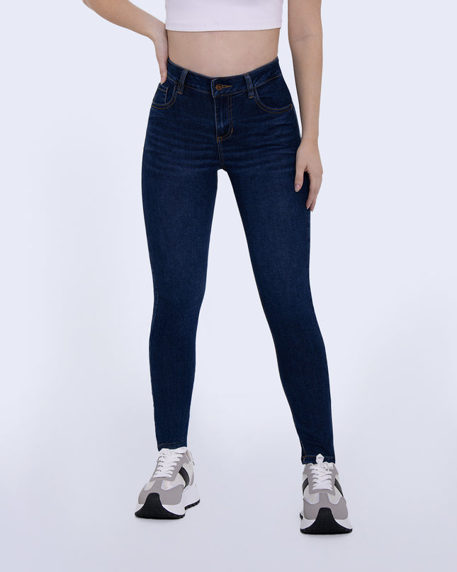 Jean Skinny oscuro tiro medio