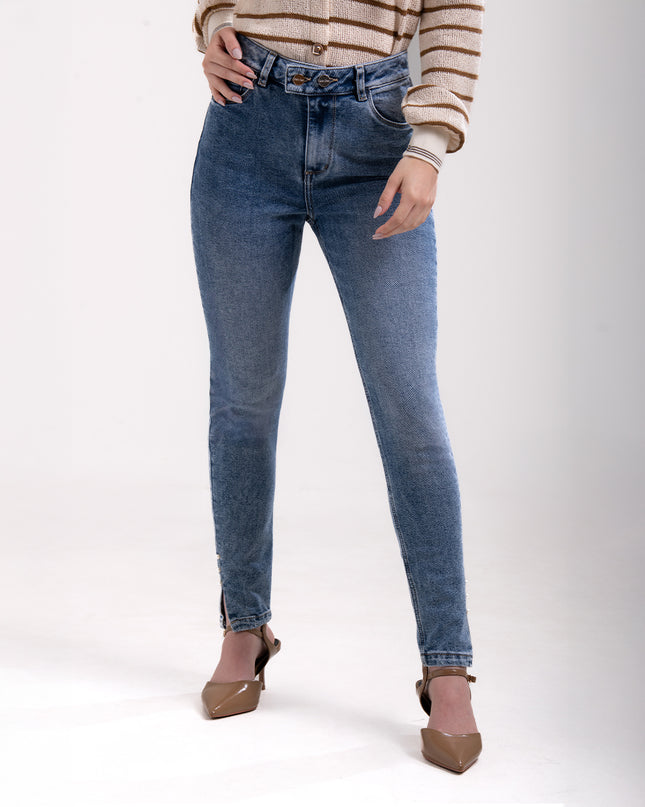 Jean Skinny tiro alto con detalle en bota