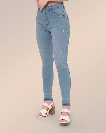 Jean Skinny claro con detalles desgastados