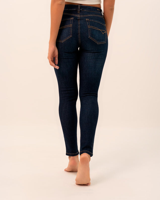 Jean Skinny tiro medio oscuro