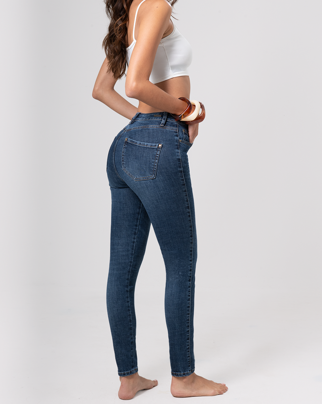 Jean Skinny tiro alto oscuro