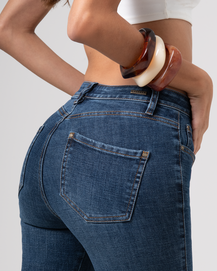 Jean Skinny tiro alto oscuro
