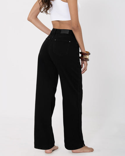 Jean Straight negro tiro alto con abertura en bota