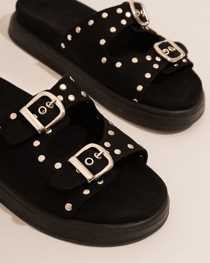 Sandalia negra con hebillas y taches