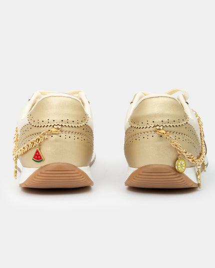Tenis Casual dorado con charm decorativos