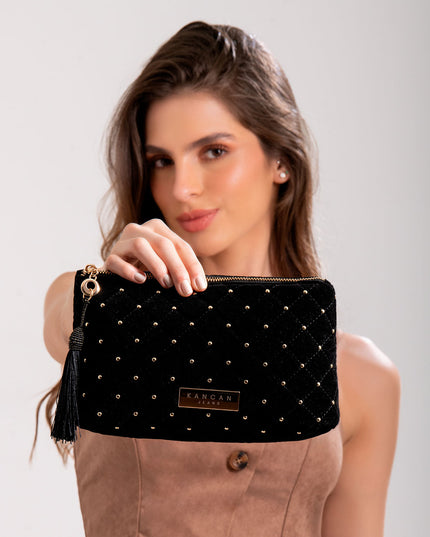 Cosmetiquera de mano en terciopelo