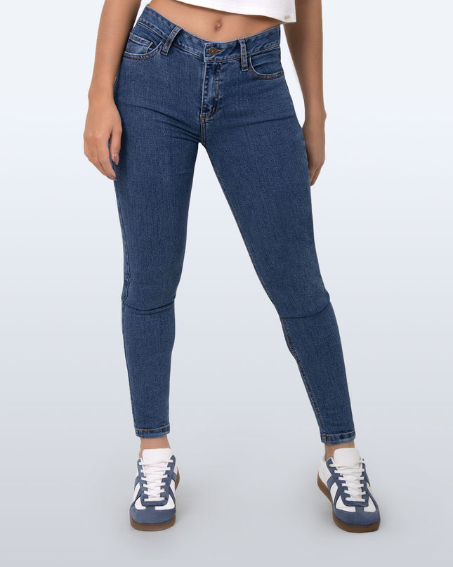 Jean Skinny oscuro tiro medio