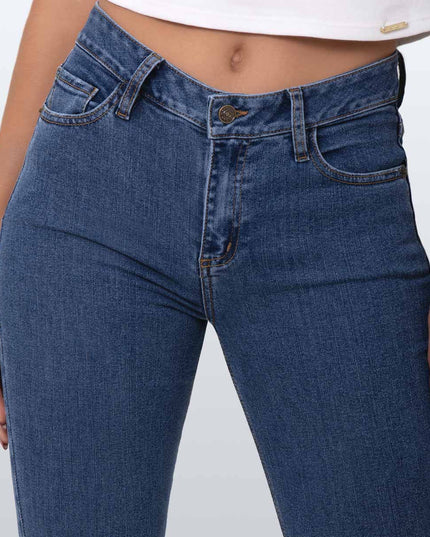 Jean Skinny oscuro tiro medio