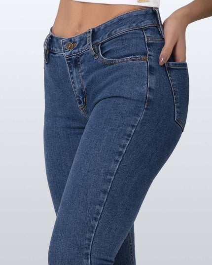 Jean Skinny oscuro tiro medio