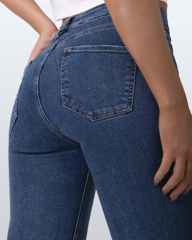 Jean Skinny oscuro tiro medio